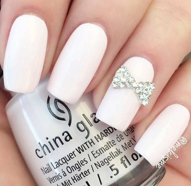 Long White Nails with Bow Accent Nail