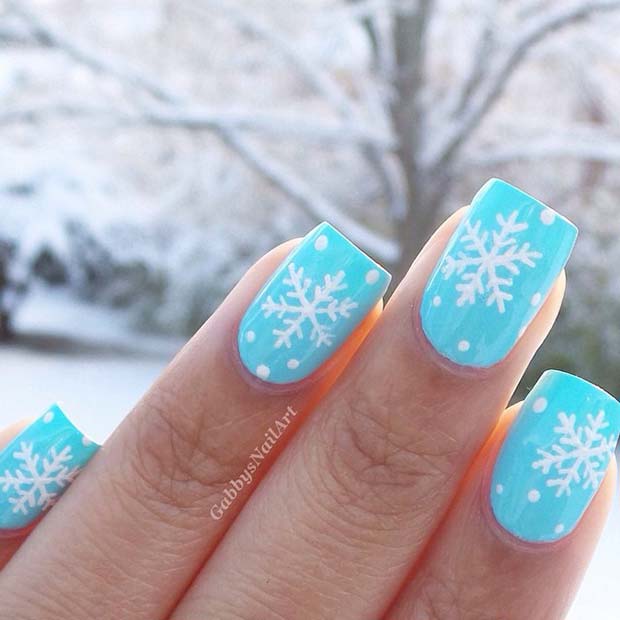 Light Blue Snow and Snowflake Nails