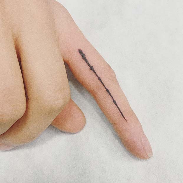 Wizard's Wand Finger Tattoo