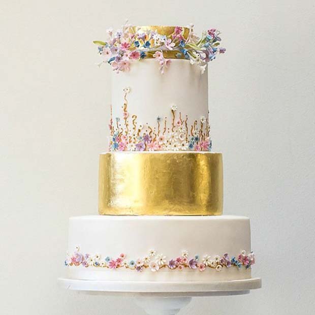 Gold Wedding Cake with Delicate Flowers