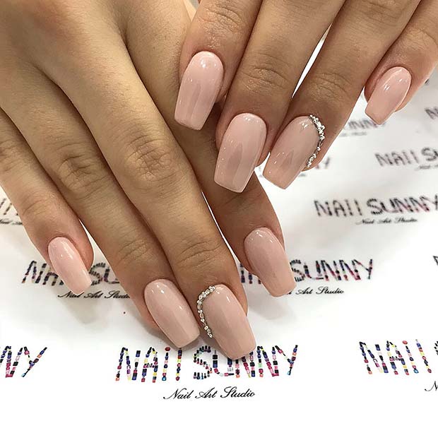 Elegant Nude Nails with Bling