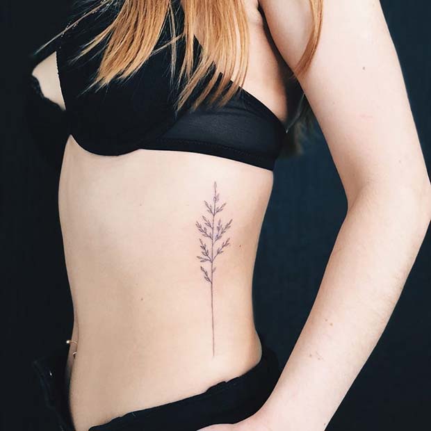 Pretty Botanical Rib Tattoo Idea
