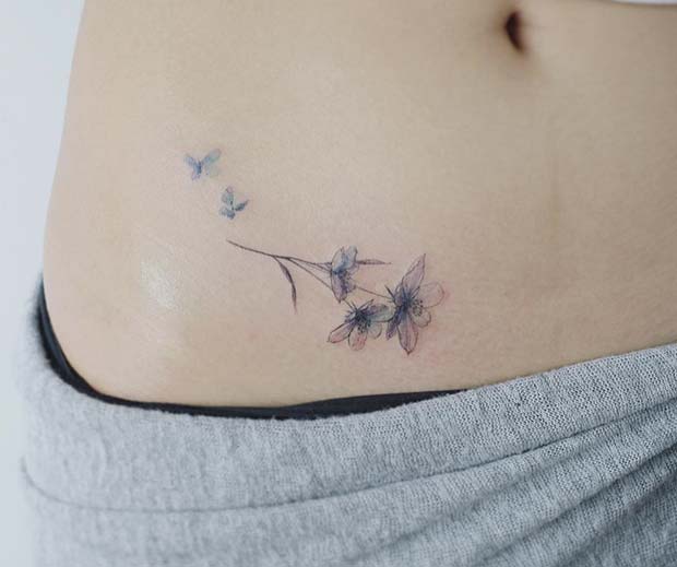 Delicate Flower Hip Tattoo Idea