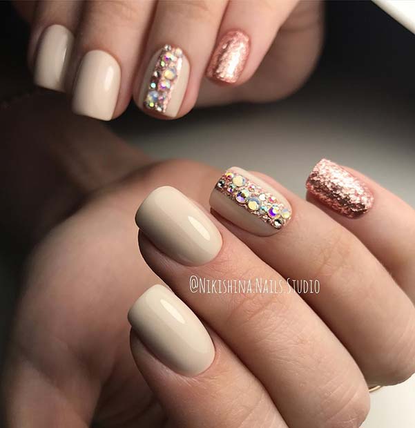 Elegant Nail Design with Glitter and Rhinestones