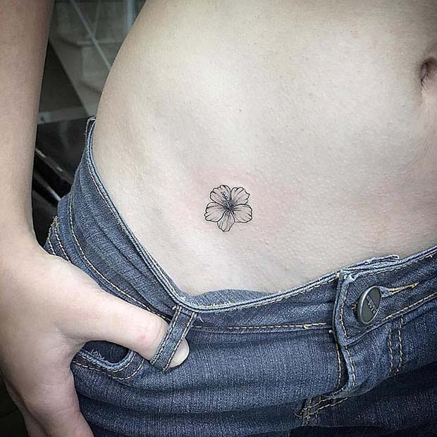 Tiny Hibiscus Hip Tattoo Idea