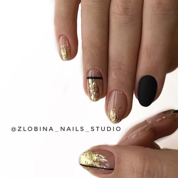 Stylish Gold Nails with Black Accent Nail