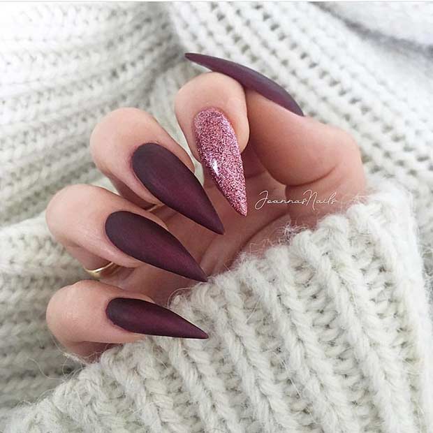 Burgundy Stiletto Nails with a Pop of Glitter
