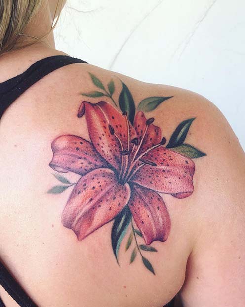 Bold and Colorful Lily Shoulder Tattoo Idea