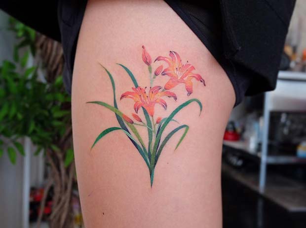 Delicate and Colorful Lily Tattoo Idea