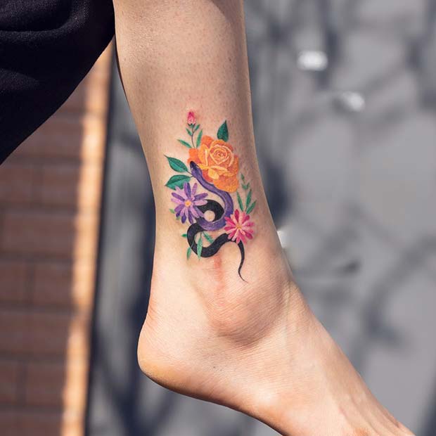 Vibrant Flowers and Snake Tattoo Design