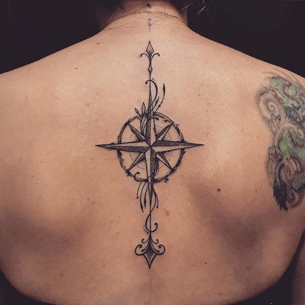 Arrow and Compass Back Tattoo Idea