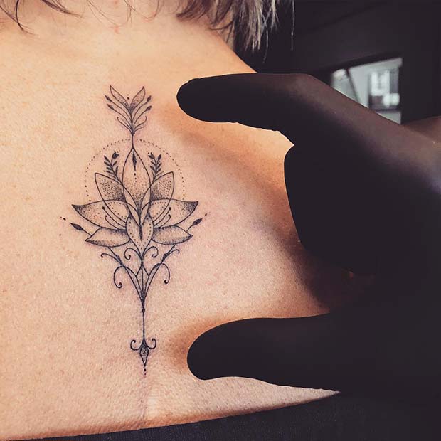Stylish Arrow and Lotus Tattoo Idea