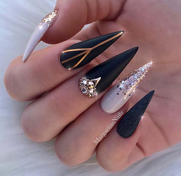 Glam Black and Gold Stiletto Nails