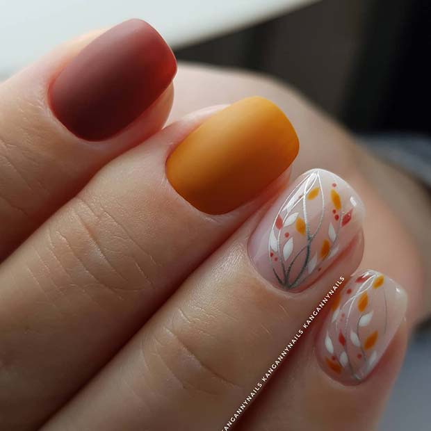 Orange and Red Nails with Botanical Accent Art