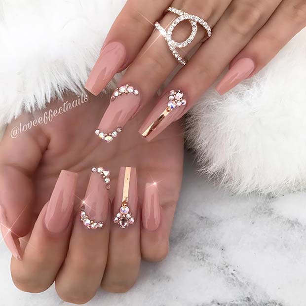 Chic Nude Nails with Crystals and Stripes