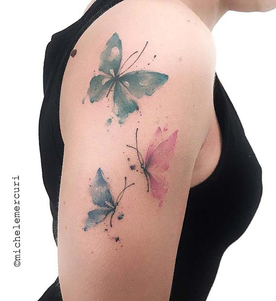 Delicate Butterfly Arm Tattoo