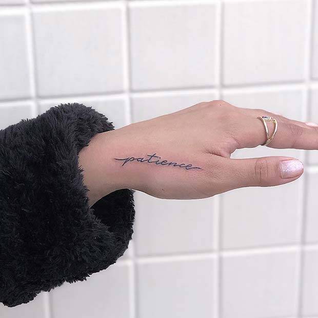 Small Hand Tattoo with a Quote