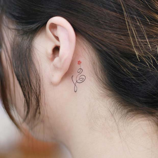 Elegant Behind the Ear Tattoo Idea