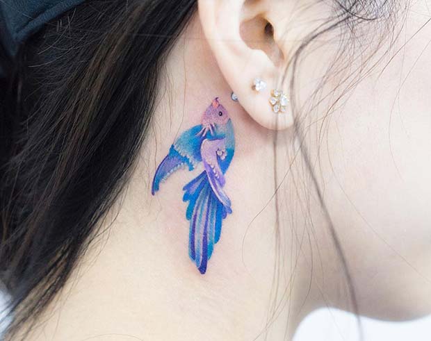 Pretty and Delicate Bird Tattoo