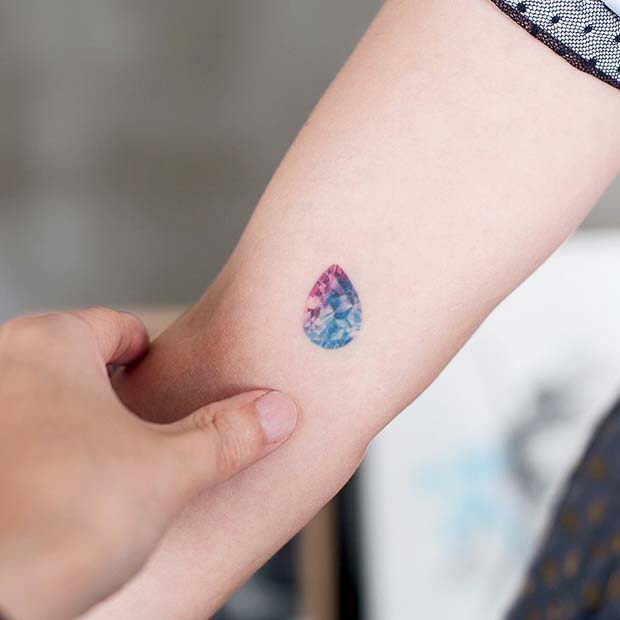 Tiny Sapphire Tattoo Idea