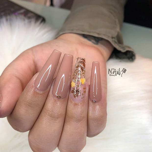 Nude Coffin Nails with a Beautiful Accent Nail