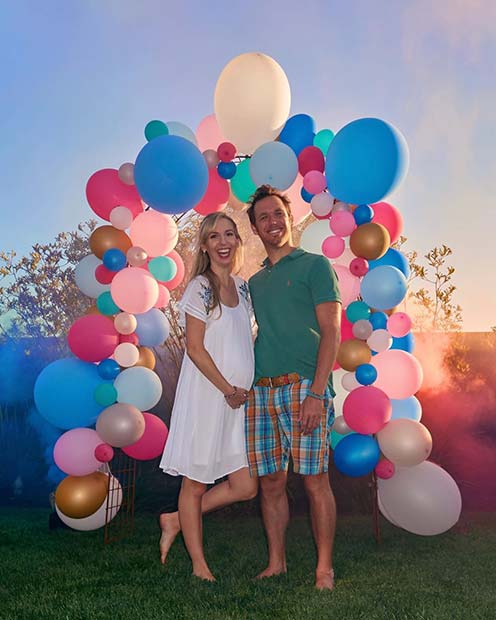 Pink and Blue Balloon Arch with Smoke
