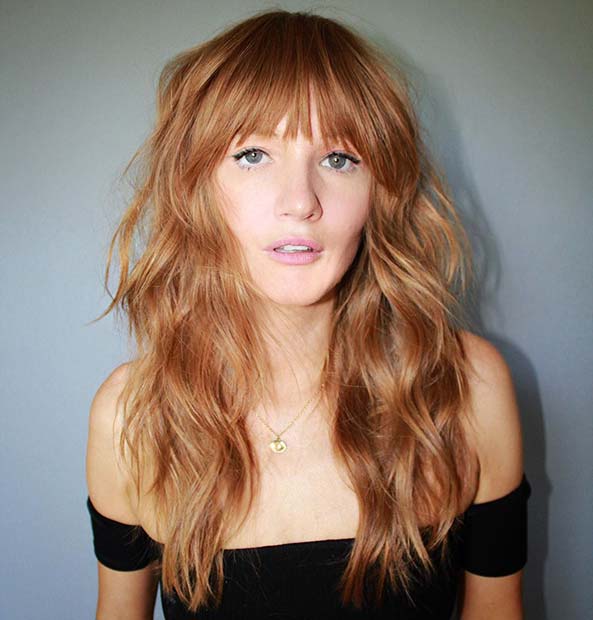 Stylish Ginger Hairstyle with Bangs