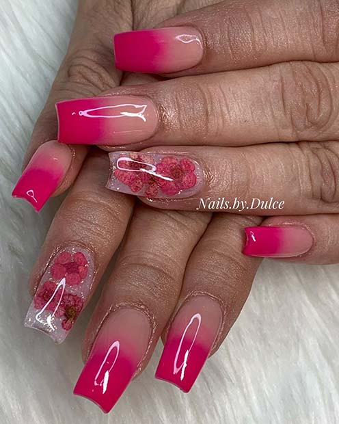 Bright Pink Ombre Nails With a Floral Accent Nail