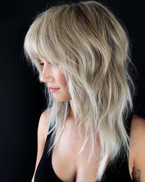 Layered Hair with Straight Across Bangs