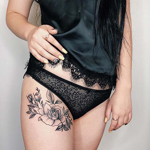 Beautiful Black Ink Flower Thigh Tattoo