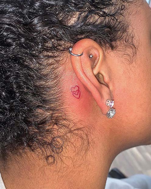 Two Hearts Behind the Ear Tattoo 