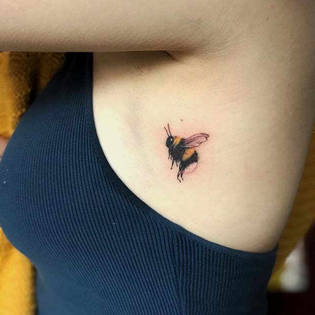 Small Rib Bee Tattoo