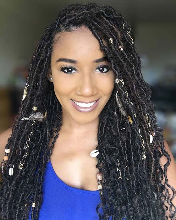 Accessorized Curly Locs with Feathers