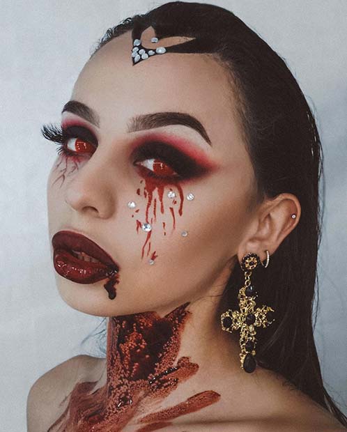 Scary Vampire Makeup with Blood and Red Eyes